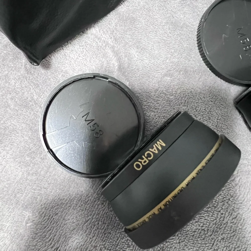 Canon Camera and a full kit with a bag and two additional lenses
